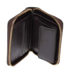 مملوكة مسبقًا محفظة مايكل كورس سحاب ملتف كانفاس مقوى شهيرة بنية