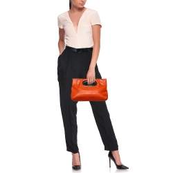 Pre Owned Michael Kors Orange Ostrich Embossed Leather Berkley Clutch