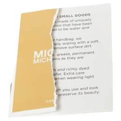 مملوكة مسبقًا حقيبة ظهر مايكل كورس ميني جيسا كانفاس كاروهات مونوغرامي وجلد أزرق