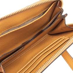 Michael Kors Tan Leather Zip Around Wristlet Wallet.