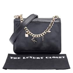 مملوكة مسبقًا حقيبة كتف مايكل كورس سواغ حلية شعار موت جلد أسود