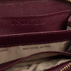 مملوكة مسبقًا محفظة مايكل كورس كومباكت سحاب ملتف مزدوج جلد سافيانو عنابي