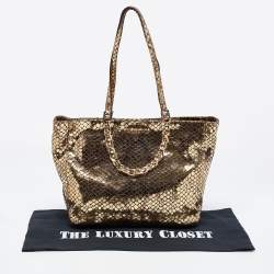 مملوكة مسبقًا حقيبة يد توتس مايكل مايكل كورس سويدي وجلد نقشة الثعبان ذهبي ميتاليك بسلسلة 