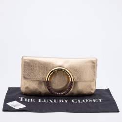 Pre Owned Michael Kors Gold Leather Skorpios Foldover Clutch