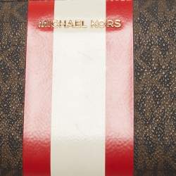 Pre Owned Michael Kors Brown Signature Coated Canvas Zip Around Wristlet Wallet