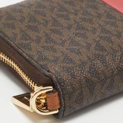 Pre Owned Michael Kors Brown Signature Coated Canvas Zip Around Wristlet Wallet