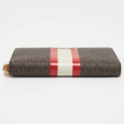 Pre Owned Michael Kors Brown Signature Coated Canvas Zip Around Wristlet Wallet