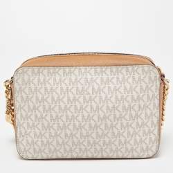 Pre Owned Michael Kors Beige/Tan Signature Star Cut-Out Coated Canvas and Leather Jet Set Crossbody Bag