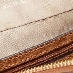 Pre Owned Michael Kors Beige/Tan Signature Star Cut-Out Coated Canvas and Leather Jet Set Crossbody Bag