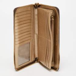 مملوكة مسبقًا Michael Kors Brown Signature Coated Canvas Strap Zip Around Wallet