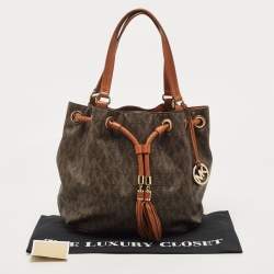 Pre Owned MICHAEL Michael Kors Brown/Tan Signature Coated Canvas and Leather Jet Set Drawstring Bag