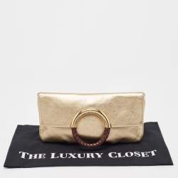 Pre Owned Michael Kors Gold Leather Skorpios Foldover Clutch