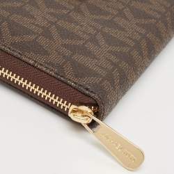 Pre Owned Michael Kors Brown Signature Coated Canvas Logo Zip Around Wallet