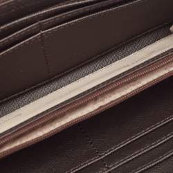 Pre Owned Michael Kors Brown Signature Coated Canvas Logo Zip Around Wallet