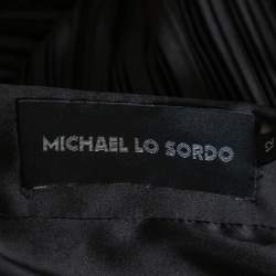 Pre Owned تنورة مايكل لو سوردو بليسيه حافة غير متماثله مزينة فتحة ماكسي ساتان أسود مقاس وسط (ميديوم)