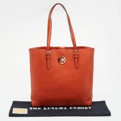 مملوكة مسبقًا Michael Michael Kors Orange Leather Large Jet Set Travel Tote