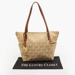Pre Owned MICHAEL Michael Kors Beige/Brown Signature Canvas and Leather Jet Set Top Zip Tote
