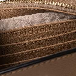 مملوكة مسبقًا حقيبة كروس مايكل كورس ميني سيلما جلد بني 