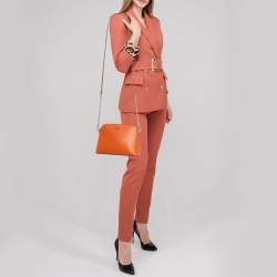 Pre Owned MICHAEL Michael Kors Orange Leather Medium Logo Dome Crossbody Bag