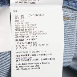 Pre Owned تنورة ميني ميو ميو جينز مطوي مطرز بشعار أزرق مقاس صغير جداً - إكس سمول