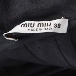 مملوكة مسبقًا فستان ميو ميو صوف أسود مفرغ بفيونكة مزينة واسع S