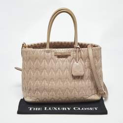 Pre Owned Miu Miu Light Pink Matelasse Leather Bow Tote