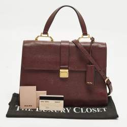 Pre Owned حقيبة يد علوية ميو ميو غطاء دفع قفل جلدي مادراس عنابي