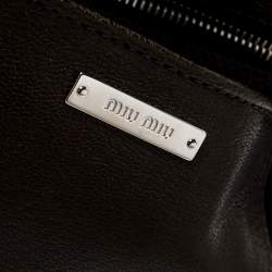 مملوكة مسبقًا حقيبة كروس ميو ميو قفل دفع جلد أخضر داكن