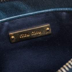 Pre Owned Miu Miu Blue Diamond Quilted Leather Zip Wristlet Clutch