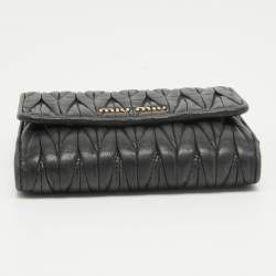 Pre Owned Miu Miu Black Matelasse Leather Flap Compact Wallet