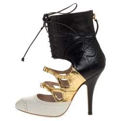 Pre Owned حذاء بوتيز ميو ميو ملتف حول الكاحل قصة جلد بروغي ثلاثي اللون مقاس 36