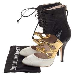 Pre Owned حذاء بوتيز ميو ميو ملتف حول الكاحل قصة جلد بروغي ثلاثي اللون مقاس 36