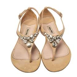 Pre Owned Miu Miu Beige Patent Leather Crystal Embellished Thong Flat Sandals Size 37.5