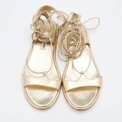 مملوكة مسبقًا Miu Miu Gold Leather Flat Ankle Wrap Sandals Size 37