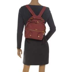Pre Owned Moschino Nude Red Leather Medium Pocket Backpack