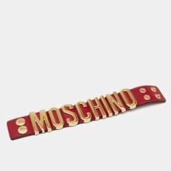 Pre Owned Moschino Logo Plaque Red Leather Gold Tone Metal Cuff Bracelet