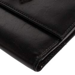 Pre Owned Moschino Black Leather Horseshoe Buckle Crystal Embellished Flap Compact Wallet
