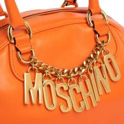 Pre Owned Moschino Orange Leather Logo Charm Bowling Bag