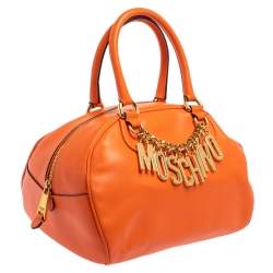 Pre Owned Moschino Orange Leather Logo Charm Bowling Bag