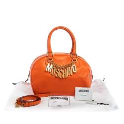 Pre Owned Moschino Orange Leather Logo Charm Bowling Bag