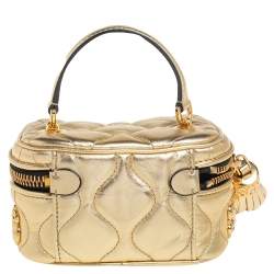 Pre Owned Moschino Gold Quilted Leather Mini Dollaro Top Handle Bag