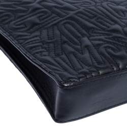 Pre Owned Moschino Black Logo Embossed Leather Wristlet Clutch