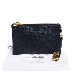 Pre Owned Moschino Black Logo Embossed Leather Wristlet Clutch