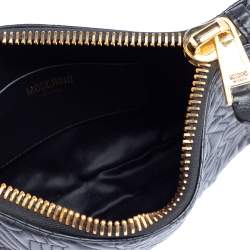 Pre Owned Moschino Black Logo Embossed Leather Wristlet Clutch