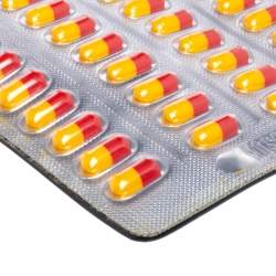 Pre Owned Moschino Silver Leather And PVC Pill Blister Wristlet Clutch