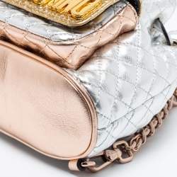 Pre Owned Moschino Metallic Silver Quilted Leather Logo Drawstring BackPack