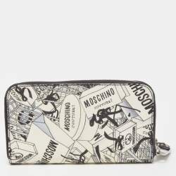 Pre Owned Moschino Black/White Printed Coated Canvas and Leather Zip Around Wristlet Wallet