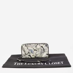 Pre Owned Moschino Black/White Printed Coated Canvas and Leather Zip Around Wristlet Wallet