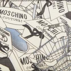 Pre Owned Moschino Black/White Printed Coated Canvas and Leather Zip Around Wristlet Wallet