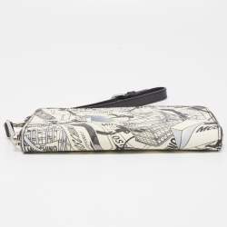 Pre Owned Moschino Black/White Printed Coated Canvas and Leather Zip Around Wristlet Wallet